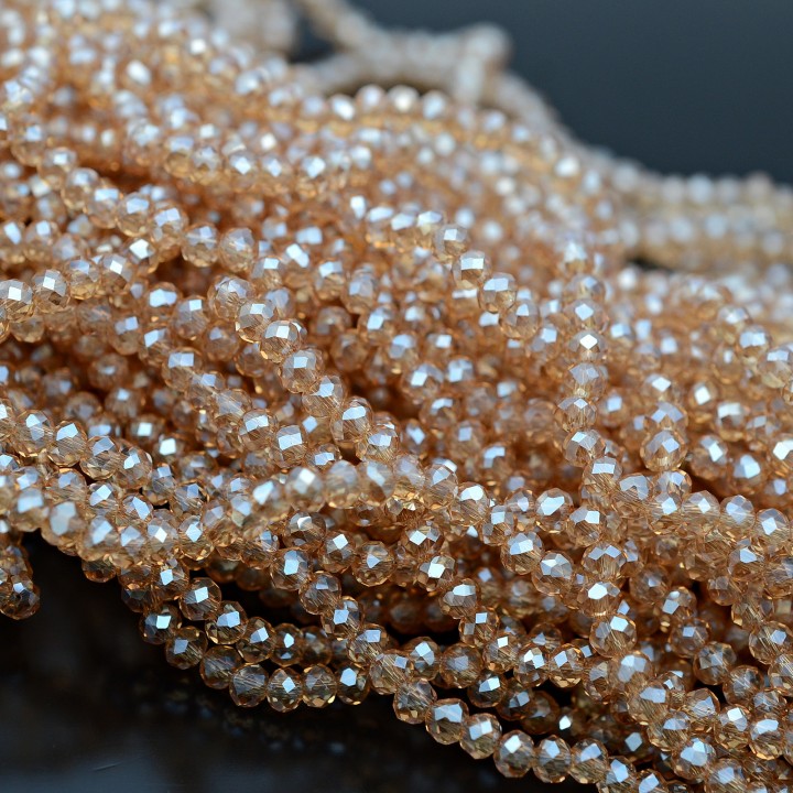 Rondeles facetados de cristal 3:2mm color Champán, 1 hilo(~110 rondeles)