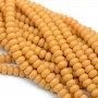 Rondeles 5:8mm vidrio color Mostaza, 1 hilo(~75 rondeles)