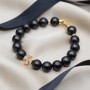 Bracelet with matte black Shell pearls, 16K gold plated