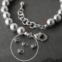 Bracelet with hematite and Bola pendant, rhodium plated