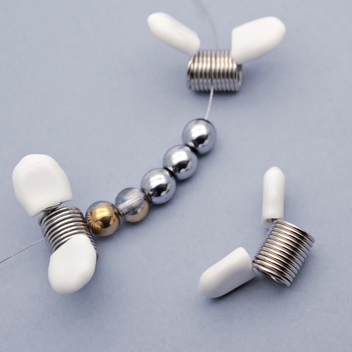 Зажим-пружина для фиксации тросика цвет белый, нержавеющая сталь