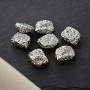 Meteorite bead of irregular shape 11.5:9.5mm brass, 1 piece