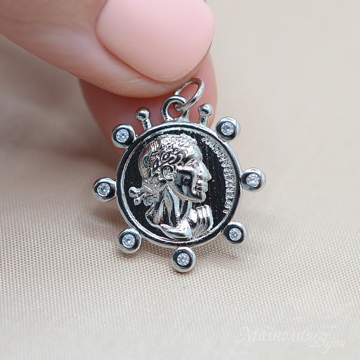 Coin pendant with cubic zirkonia, platinum color
