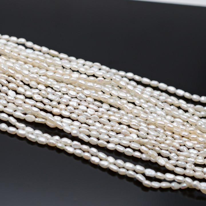 Perla natural cultivada A+ grano de arroz ~2-3mm color blanco, 1 tira 36cm