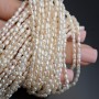 Perla natural cultivada A+ grano de arroz ~2-3mm color blanco, 1 tira 36cm