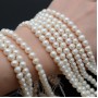 Pearls round ~6mm white, thread (36cm)