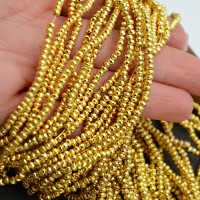 Гематит рондель граненый 3:2мм цвет золото, 1 нить(~195 штук)