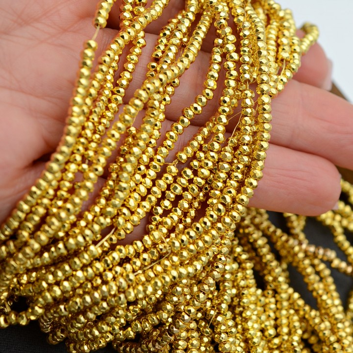 Гематит рондель граненый 3:2мм цвет золото, 1 нить(~195 штук)