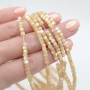 Mother-of-pearl Rondelle 4:3mm caramel color, thread 40cm