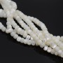 Nácar(madre perla) Rondel 6:4mm color blanco, 1 tira