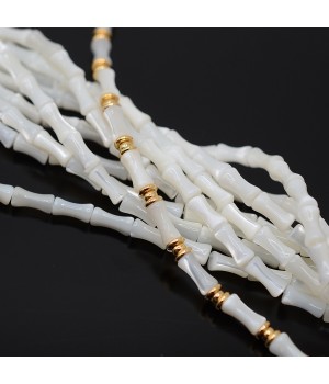 Nácar(madre perla) Bambú 7:4mm color blanco, 1 tira