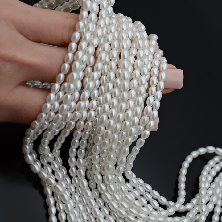 Perla forma arroz 3.5:5mmmm cristal color blanco, 1 hilo
