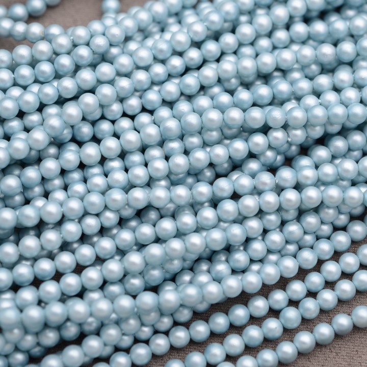 Tira de 98 cuentas de perla de concha 4mm satén mate, color celeste